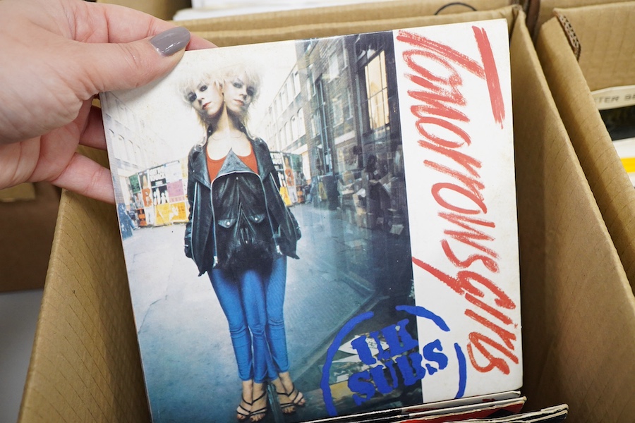 Four boxes of 7 inch singles, labels include; Coral, Parlophone, RCA, HMV, Columbia, etc. artists include; Dolly Parton, Gene Simmons, Alice Cooper, Ultravox, Motorhead, Dr. Feelgood, Buddy Holly, the Crickets, Manfred M